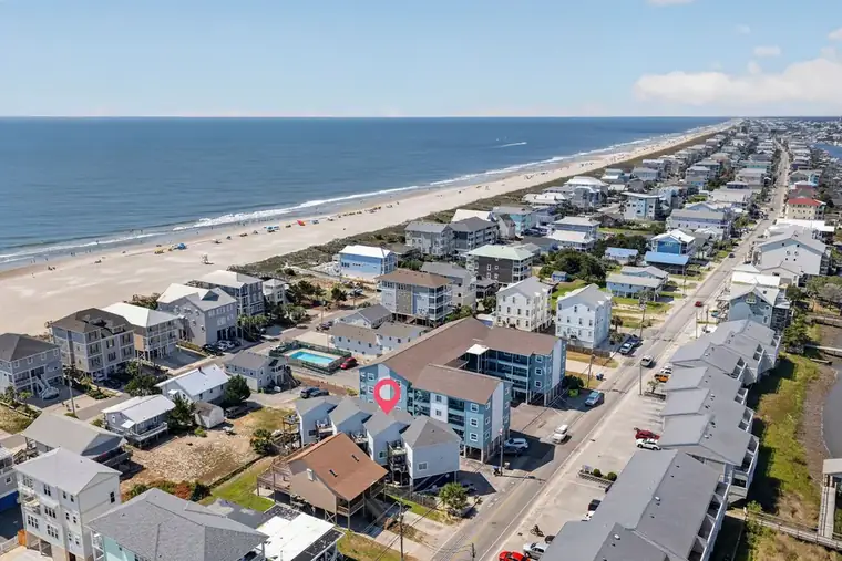 Aerial of the Carolina Beach strand stretching to the horizon